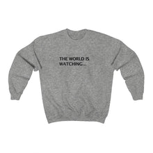THE WORLD IS WATCHING... Crewneck Sweatshirt